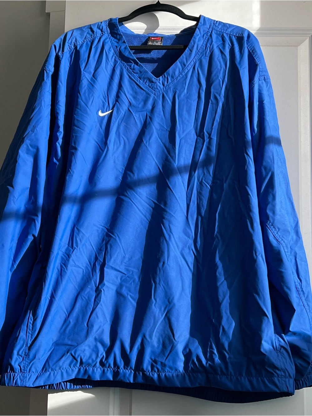 Nike Blue Men’s V‑Neck Pullover Windbreaker with White Swoosh